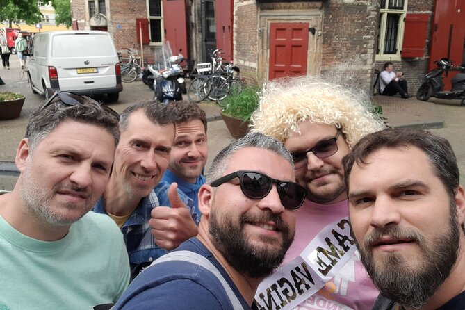 Amsterdam Red Light District Treasure: Self-Guided Tour & Quest - Start beneath Central Station’s grand facade