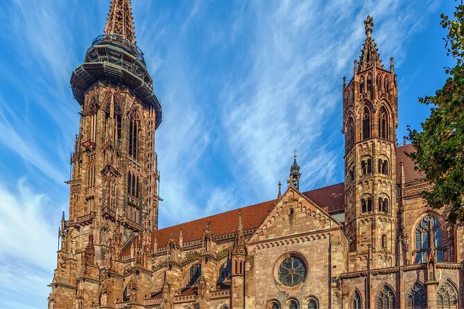 Freiburg Scavenger Hunt and Highlights Self Guided Audio Tour - Martinstor and the Historisches Kaufhaus