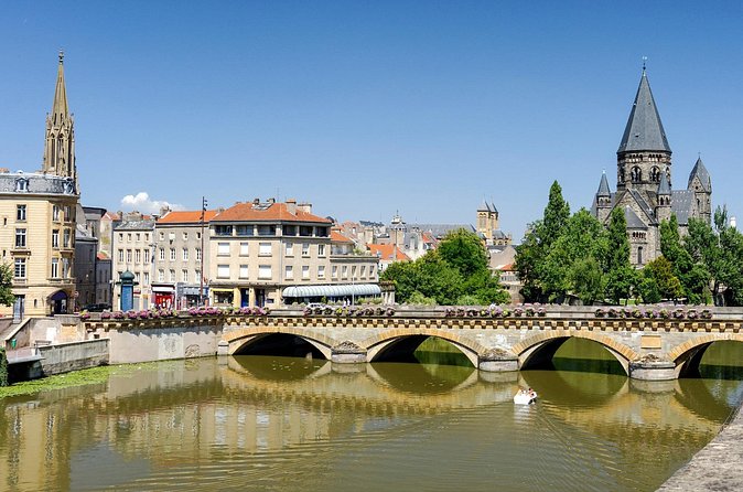 Metz Scavenger Hunt and Highlights Self Guided Audio Tour - Le Temple Neuf finishes beside the water