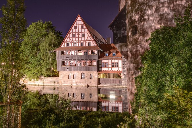 Nuremberg Scavenger Hunt and Highlights Self Guided Audio Tour - Ehekarussell and Fleischbrücke: sculpture and river views