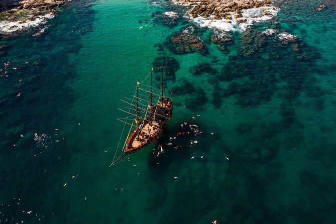 Treasure Hunt Snorkeling Lunch Cruise from Cabo San Lucas - A pirate ship with a Cabo view